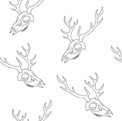 Vector seamless pattern of hand drawn sketch doodle outline deer skull isolated on white background
