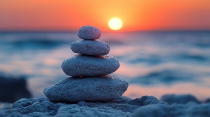 Fototapeta premium Serene Zen Stone Stacking at Sunset by the Ocean