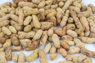 Boil nut on white background. Groundnut or Arachis hypogaea. Favorite snack at social gatherings eat with drink.