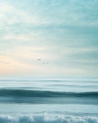 Fototapeta premium Tranquil Seascape with Birds Soaring at Sunset or Sunrise Over the Calm Ocean Horizon