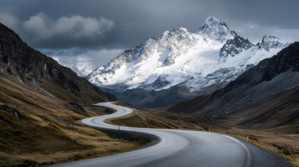 Winding Road Through Snowy Mountain Pass