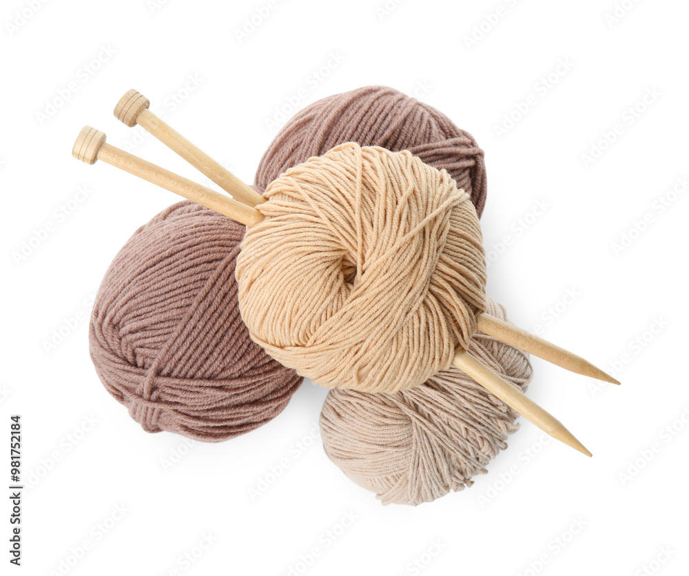 Canvas Prints Skeins of soft yarn and knitting needles isolated on white, top view