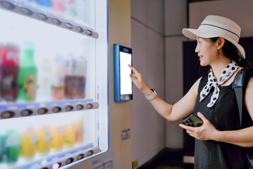 Modern Vending Experience: A Woman Choosing Beverages in a Smart Vending Machine