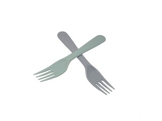 Pair of Plastic Forks on White Background