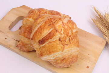 loaf of bread on wooden table
