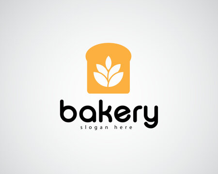 creative stacked wheat grains on bread background logo