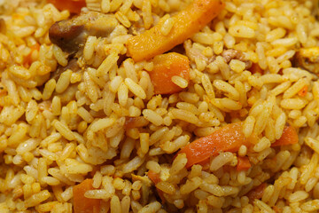 Rice with meat and carrots, top view