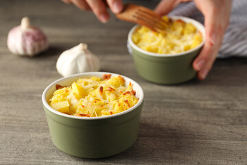 Concept of tasty and delicious homemade food - potato casserole
