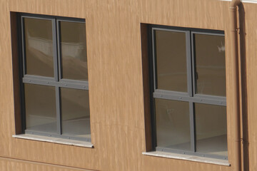 Modern MultiPaned Windows Gracefully Adorn a Stylish and Contemporary Building Design
