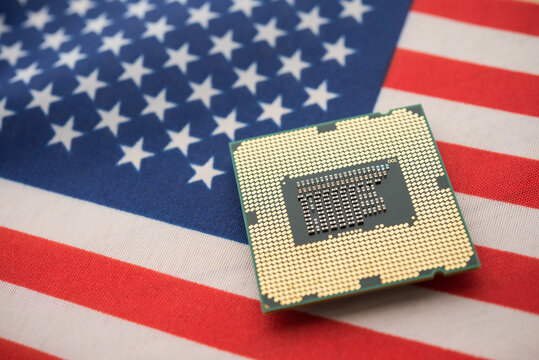 CPU (central processing unit) on United states of America flag. US vs China chip war or tech war, microchip semiconductor industry competition concept. US restrict and control chip export to China.