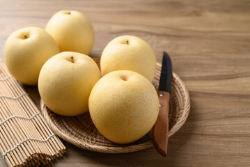 Asian pear fruit on wooden background, Sweet and juicy fruit