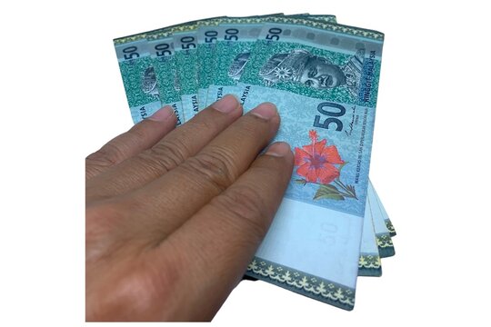 Hand pick Malaysian Ringgit (MYR) Banknote RM50 isolated on white background.
