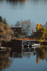reflection in the water against the summer house