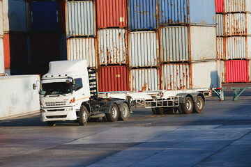 Truck comes to pick up the container.