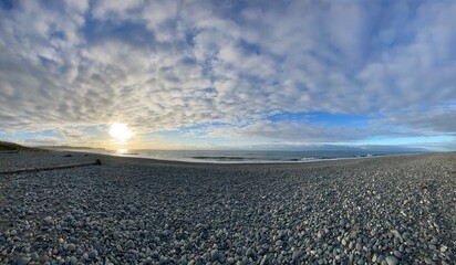Panoramic views of the stunning sunset sky on the beach