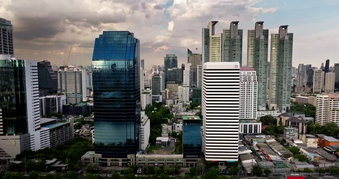 Bangkok skyline telephoto aerial view showing high-risers and moody sky
