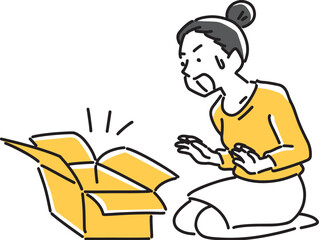 箱の中を見て驚く女性