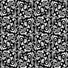 Floral pattern. Vintage wallpaper in the Baroque style. Seamless vector background. White and black ornament for fabric, wallpaper, packaging. Ornate Damask flower ornament.