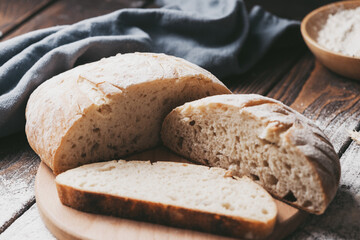 Freshly baked loaf of homemade bread on the grill