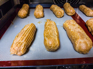 French patisserie food, eclairs dessert cooked in fan oven, choux pastry, culinary item, cake...