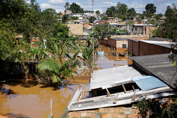 Houses are seen submerged in water during a big flood in Registro city, Ribeira valley, south of...