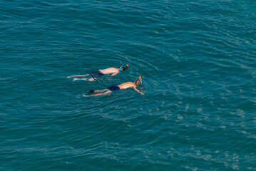 Two people snorkeling in Adriatic Sea