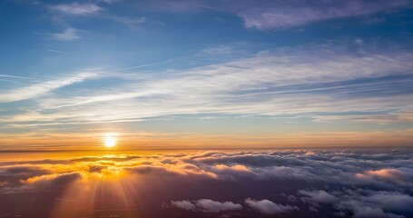Fototapeta premium Beautiful sunset sky above clouds with dramatic light.