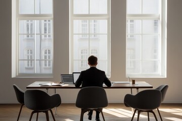 A businessman closing a major deal in a stylish, minimalist office