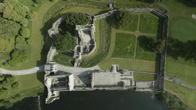 Top View Of Adare Castle Next To The Main Road Bridge Over The River Maigue In County Limerick, Ireland. Aerial Shot