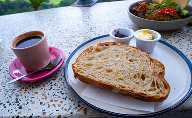 breakfast with slices of bread and coffee