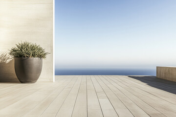 Serene coastal view from a modern terrace featuring a potted plant against a clear sky overlooking the ocean during daylight hours