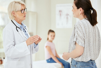 Doctor, woman and talk in clinic for healthcare, medical advice and professional opinion for child...