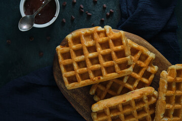 Belgian waffles on a dark background