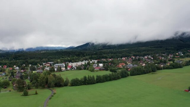 Drone shot of misty and cloudy mountains