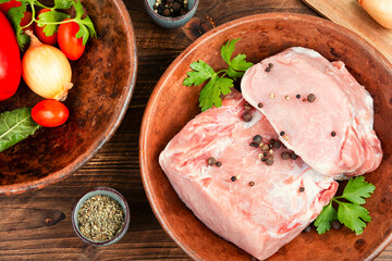 Raw pork meat and vegetables.