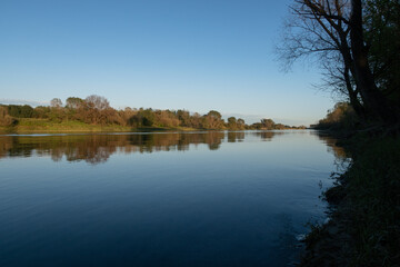Ticino river panorama banks water trees vision light evening natural naruralistic