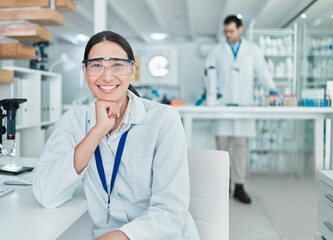 Happy woman, portrait and scientist with goggles at laboratory for medical science or microbiology. Young, female person or biologist with smile for job or career in scientific forensics at lab desk