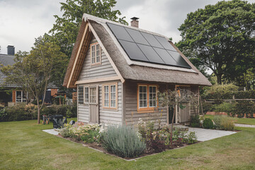 Obraz premium solar panels house on the hill