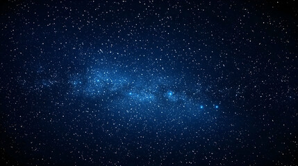 Fototapeta premium A Deep Blue Night Sky with a Dense Scatter of White Stars