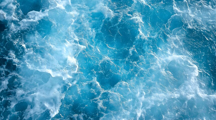 Obraz premium A Close-Up View of Ocean Water with White Foam and Bubbles, an Abstract Nature Background Image
