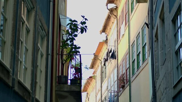 Static shot of some laundry dangleing in the wind out by the street in Porto. Portugal.
