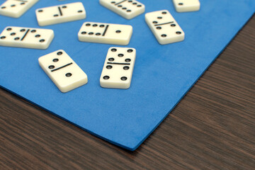 Dominoes bones on blue background	