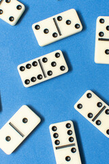 Dominoes bones on blue background	