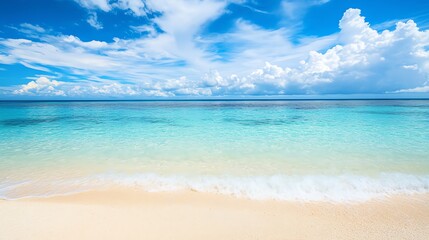 Obraz premium Idyllic tropical beach with crystal clear turquoise water and white sand.