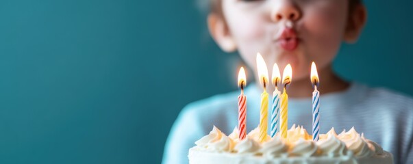 A joyful child blowing out birthday candles on a cake, capturing the essence of celebration and festive moments.