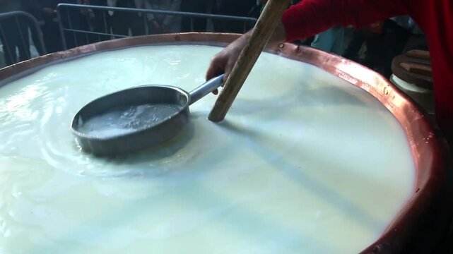 production of parmesan cheese milk boiling and maturing typical product reggio and parma emilia romagna