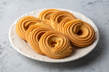 Sweet and tasty round butter cookies. Round ring shaped German spritz biscuits