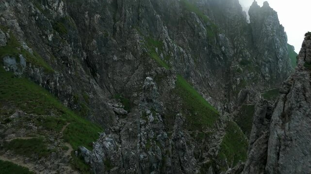 Lombardy, Italy - A Breathtaking Vista of Grignetta's Rugged, Jagged Peaks - Drone Flying Forward