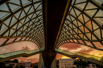Bridge of Peace over the Kura River at sunset.Tbilisi,Georgia.         © andibandi