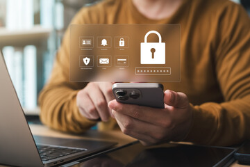 Cyber ​​security technology, data protection, businessman using mobile phone and laptop with padlock, data encryption security system, protection from hackers and viruses, data protection from crime.